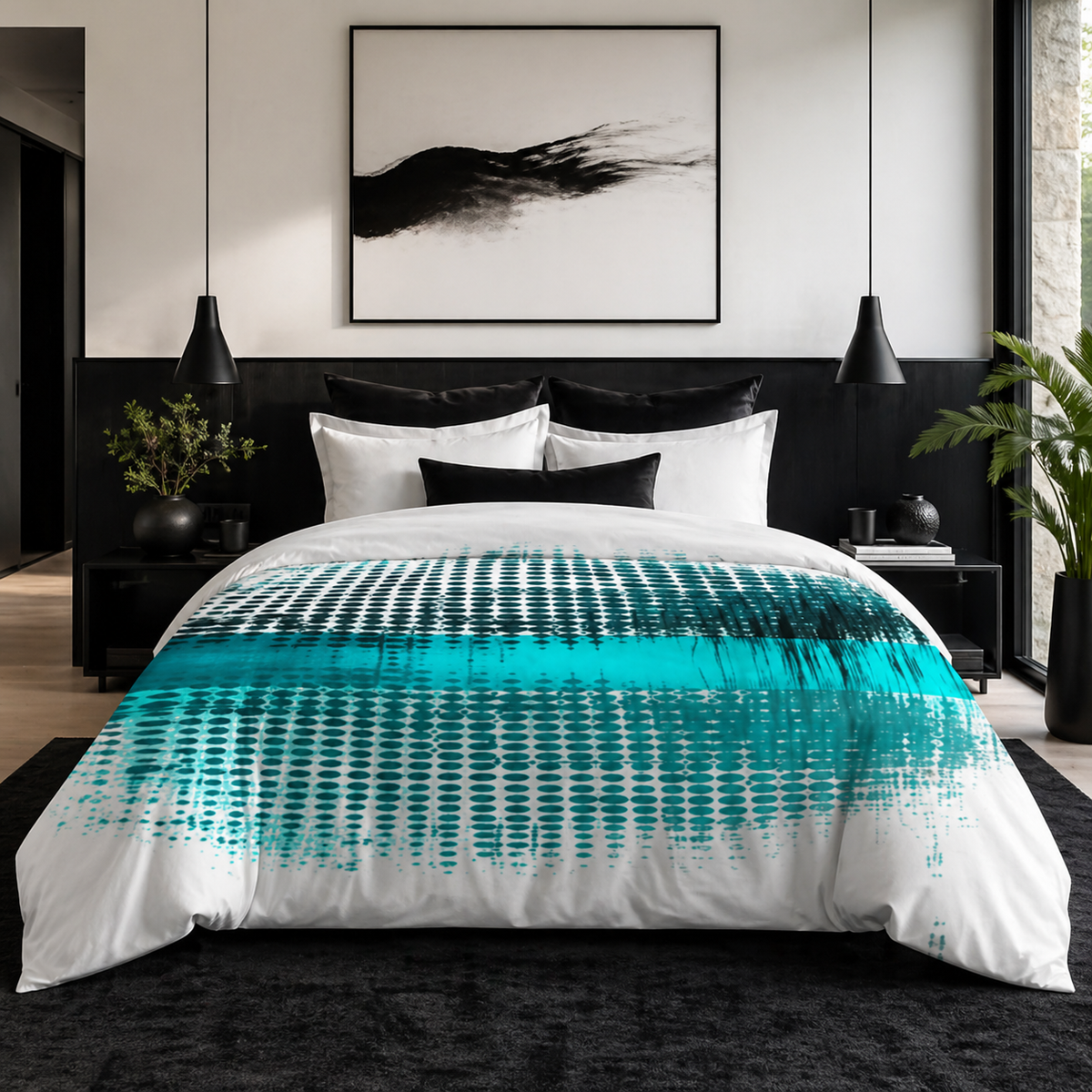 A bed with a teal-and-white duvet patterned with repeating dark marks in a black-and-white bedroom.