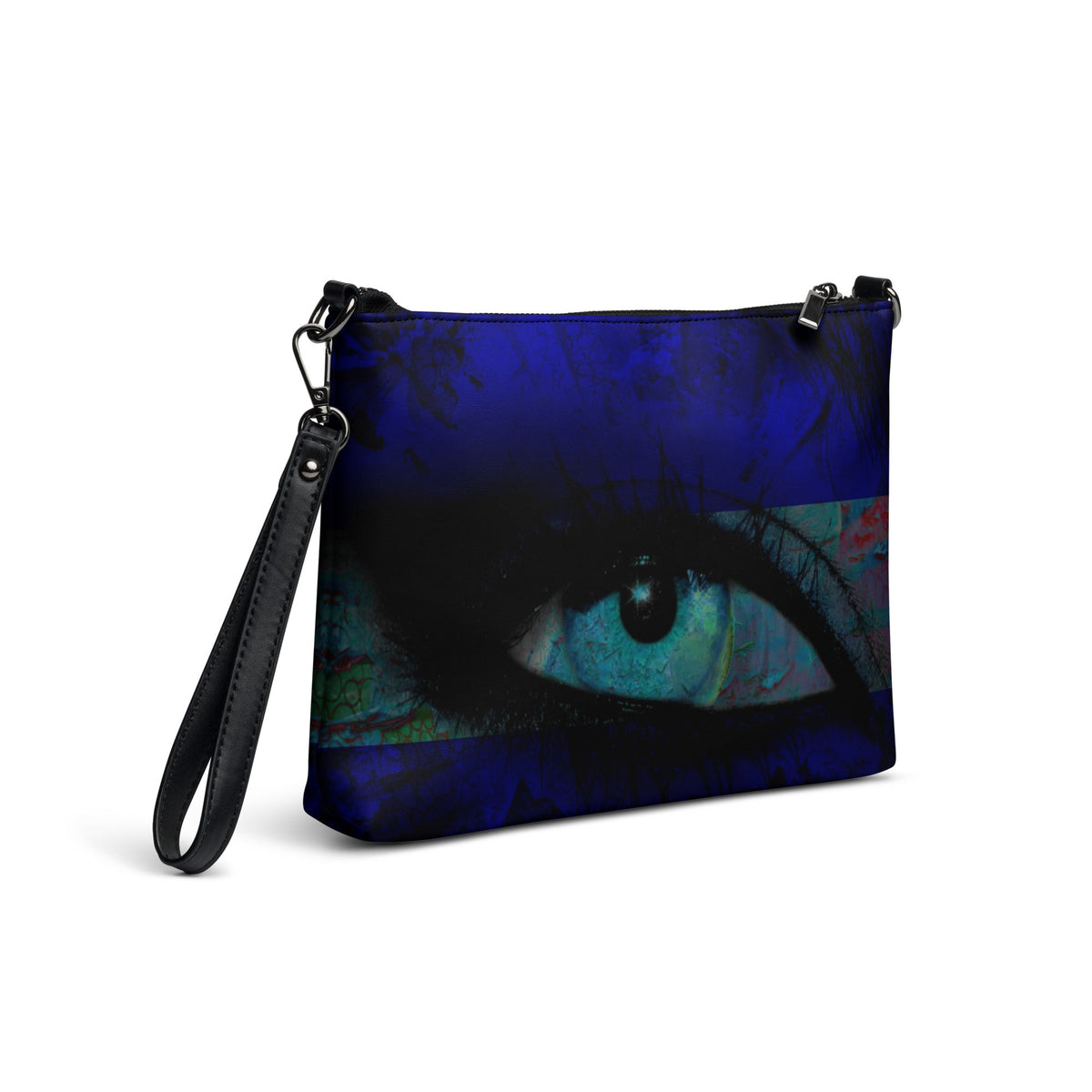 A dark blue wristlet bag with a large turquoise eye printed across the front.