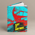 Say It Anyway journal slightly open, front facing camera on greige.