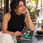 Woman beside Seen, Not Rattled journal at a sidewalk cafe.