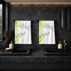 Two Shift Happens hand towels displayed in a dark bathroom.