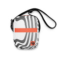 Front view of the Wrong Turn crossbody bag with black-and-white wavy stripes, an orange band, and orange monogram patch.