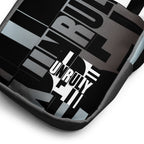 Close-up of the Unruly bag's black, white, and gray design with bold “UNRULY” lettering.
