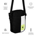 Personal Baggage black crossbody bag with a white stripe and Spanish feature callouts.