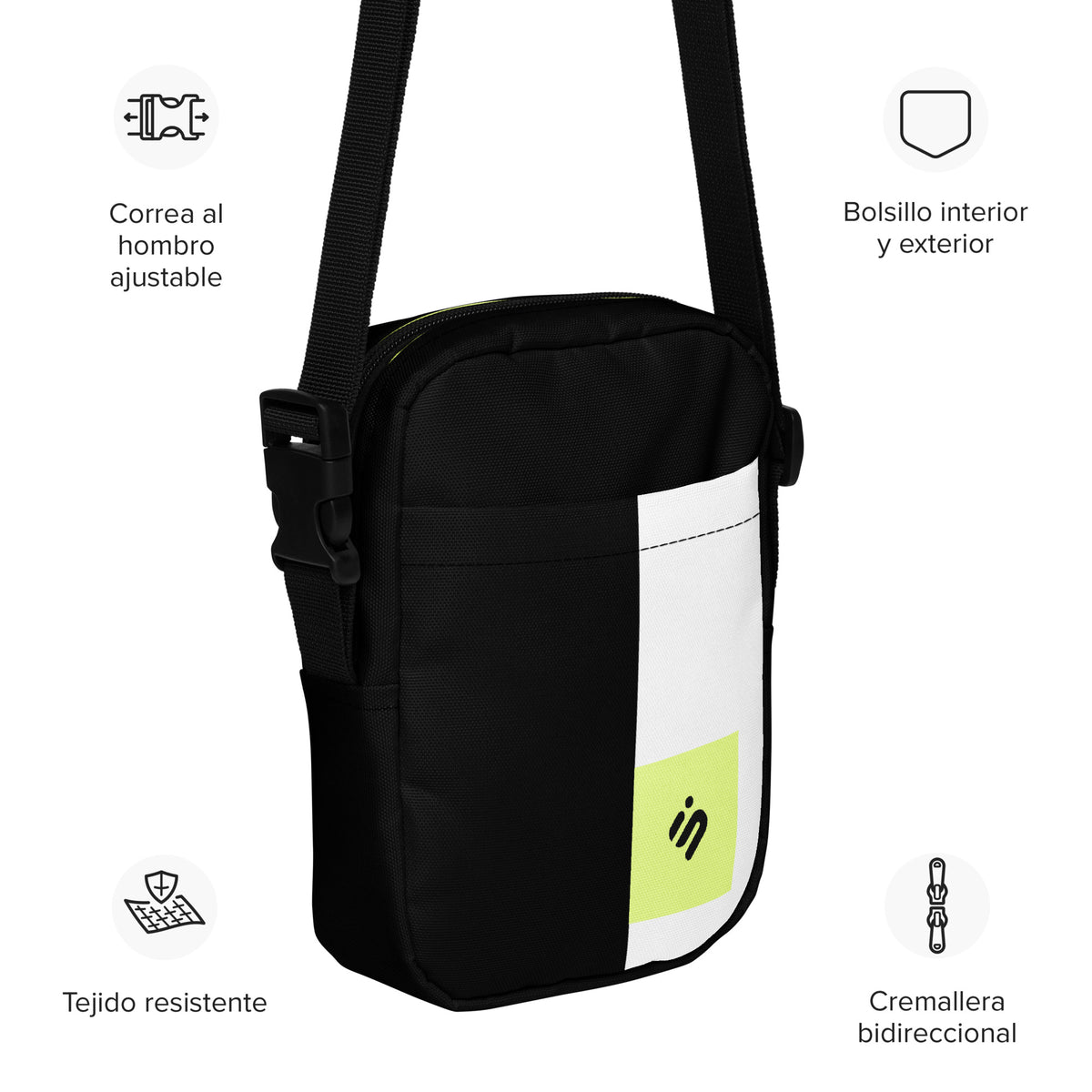 Personal Baggage black crossbody bag with a white stripe and Spanish feature callouts.