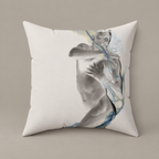 Smoke, Then Rise faux-suede pillow with a grayscale figure and blue watercolor lines on a warm greige studio surface.